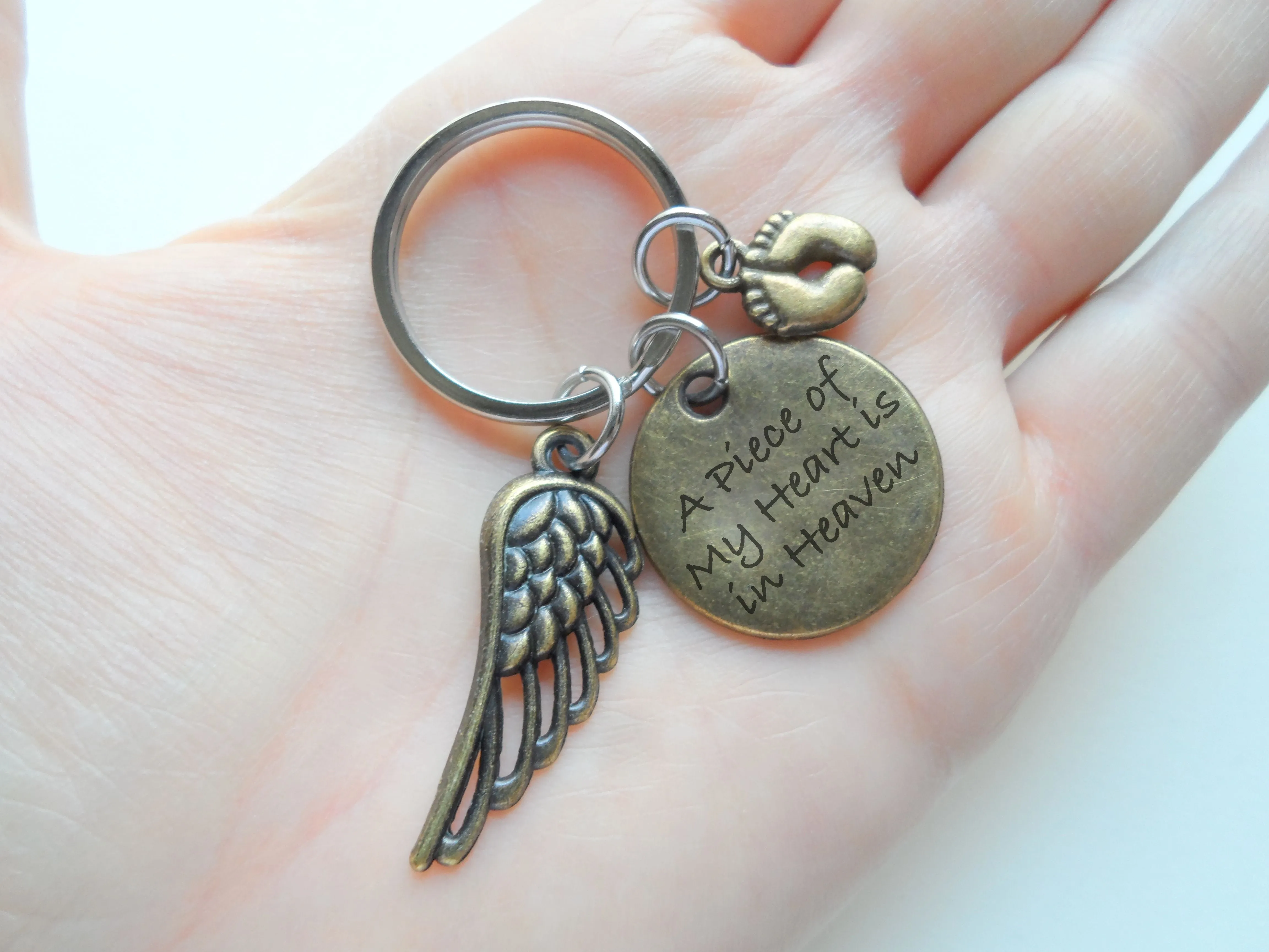 A Piece of My Heart is in Heaven Baby Feet Charm Memorial Keychain, Bronze Engraved Disc, Feet, & Wing Charm