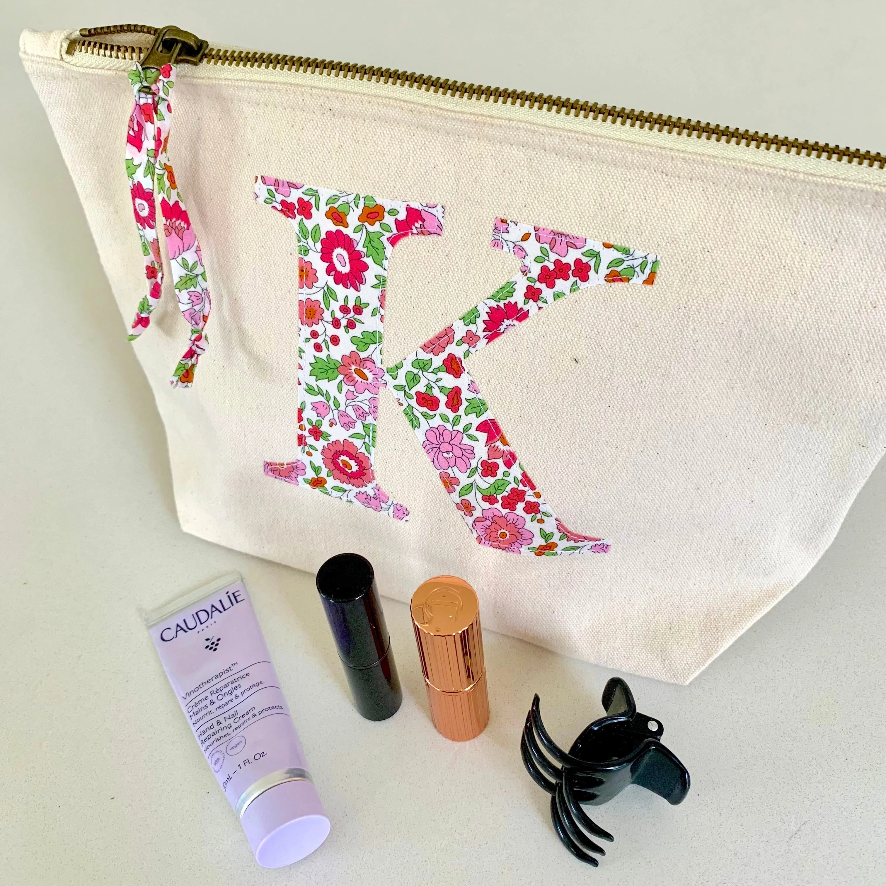 Cream initial pouch