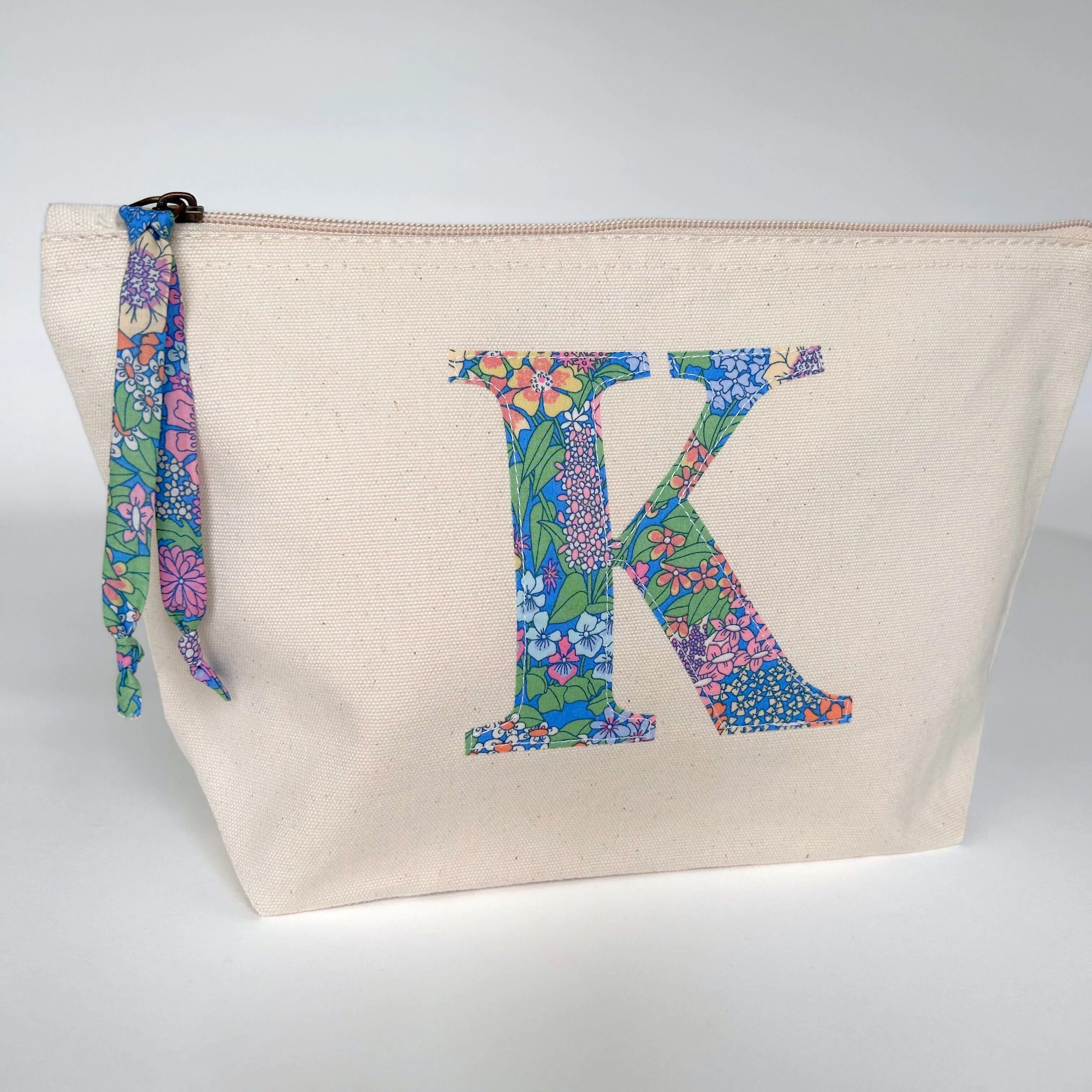 Cream initial pouch