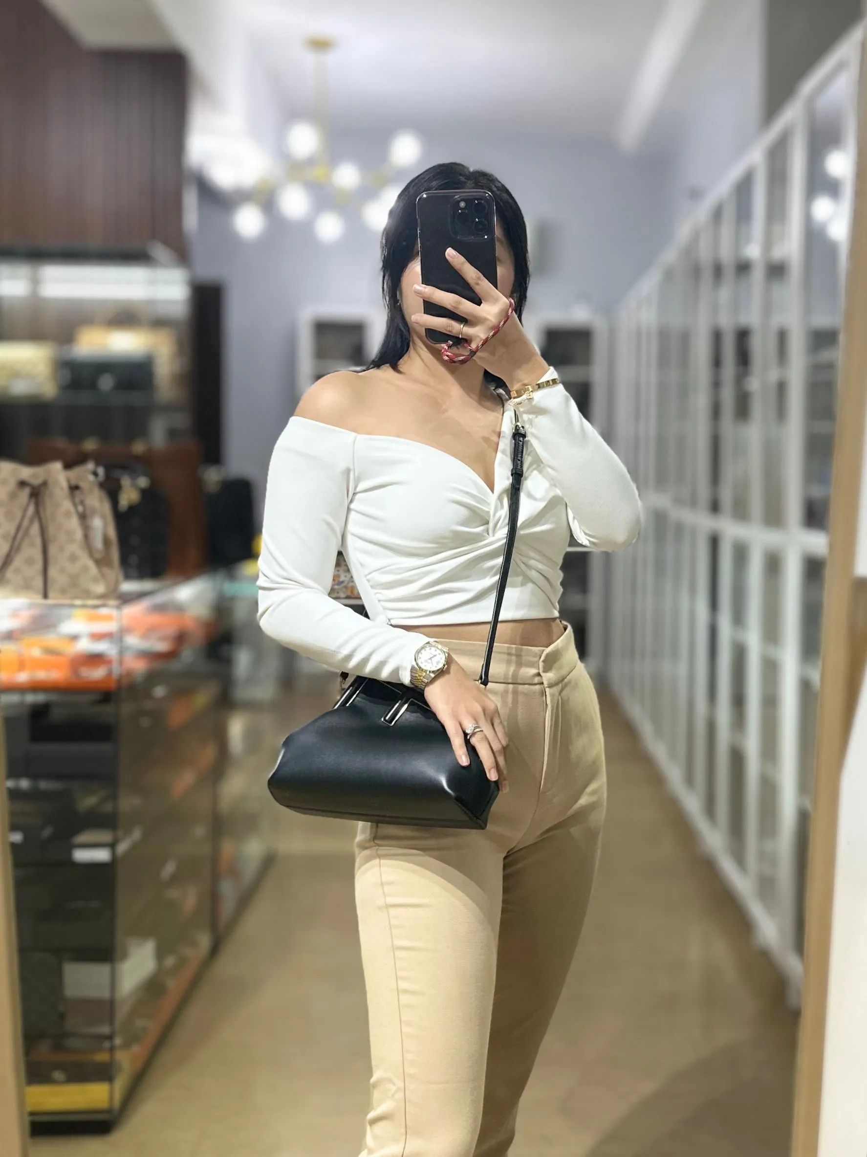 First Small in Noir Nappa Bag