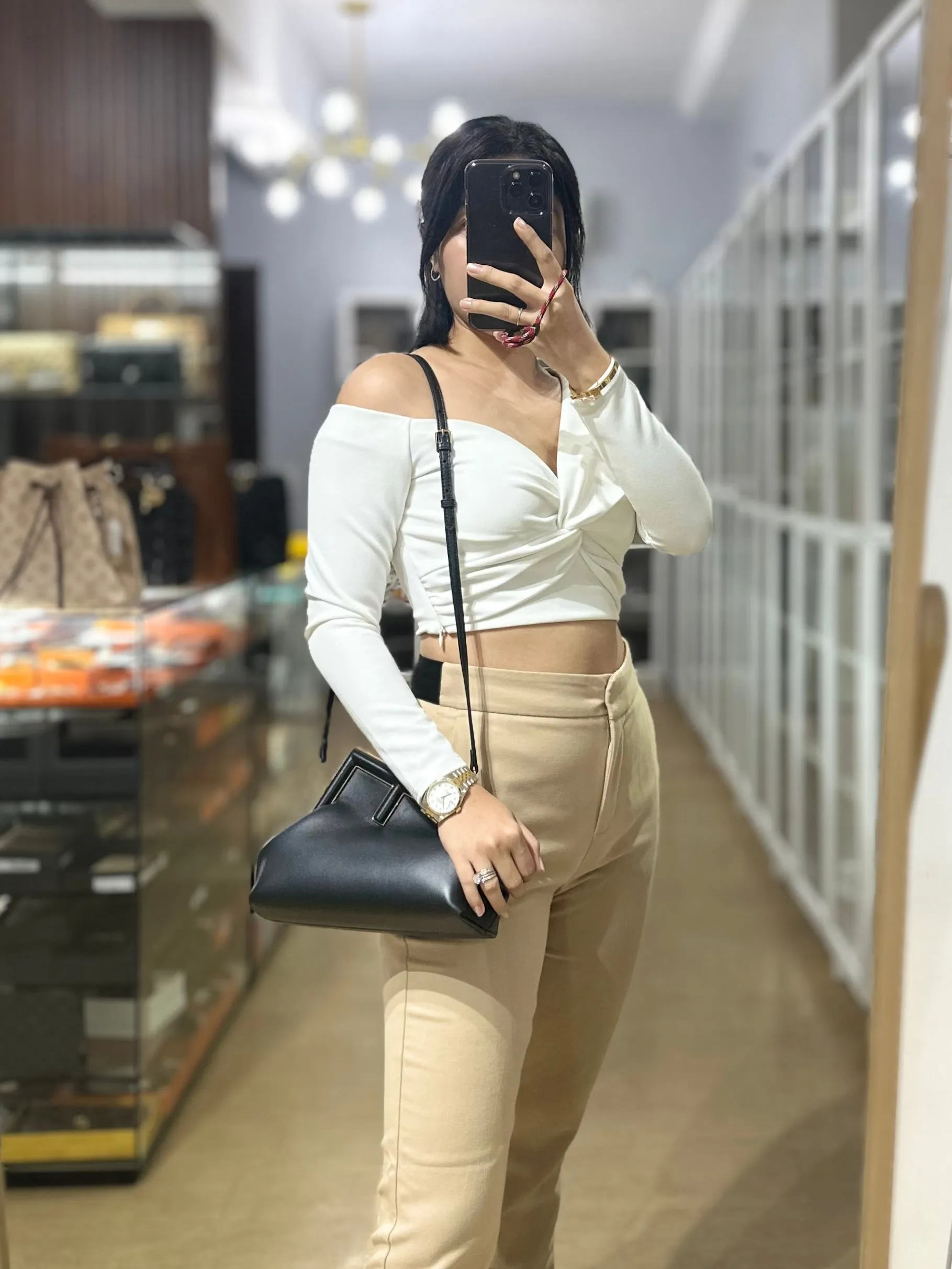 First Small in Noir Nappa Bag