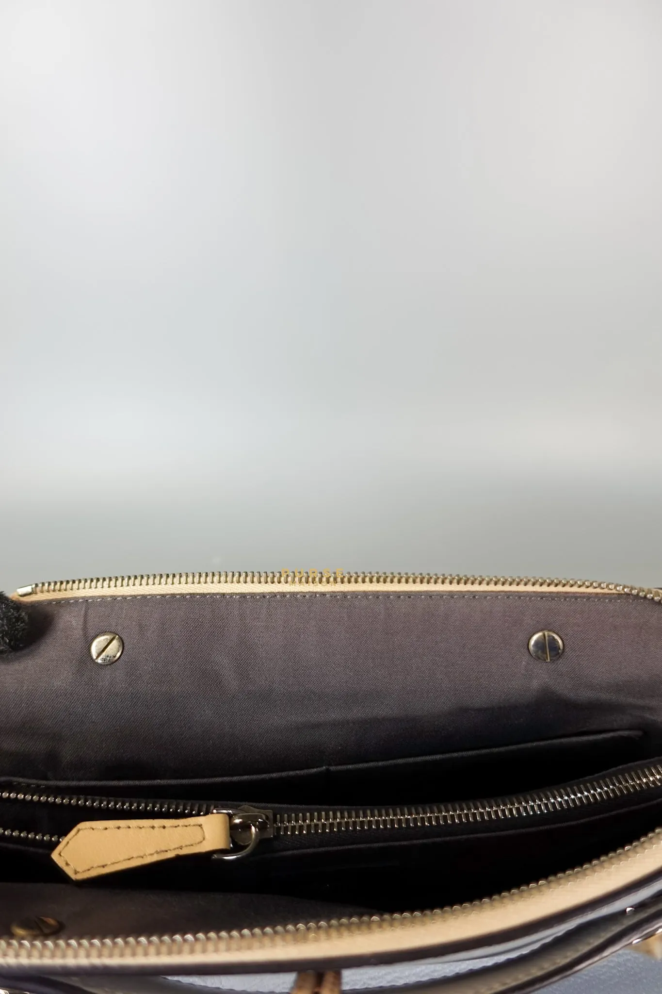 First Small in Noir Nappa Bag