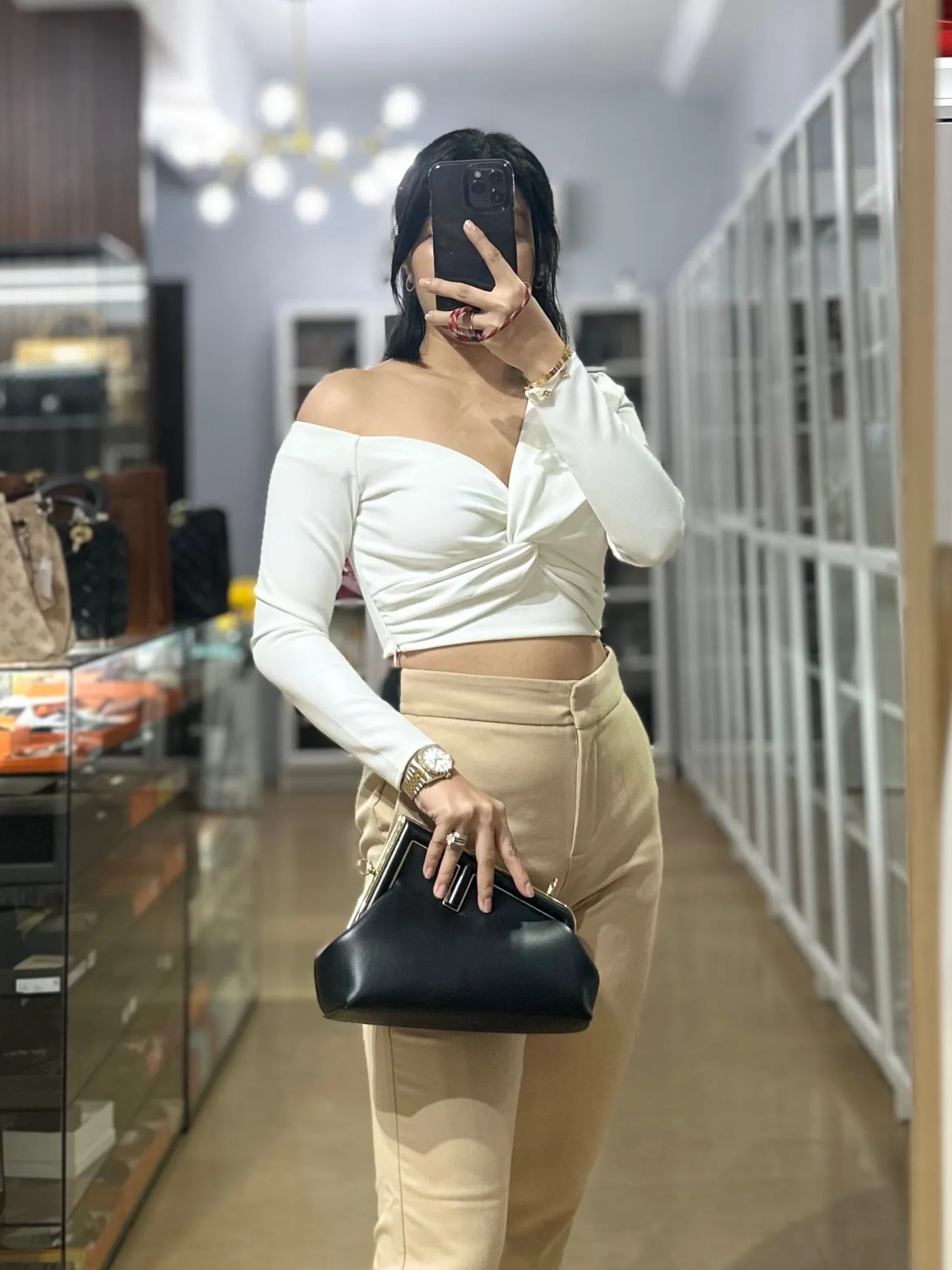 First Small in Noir Nappa Bag