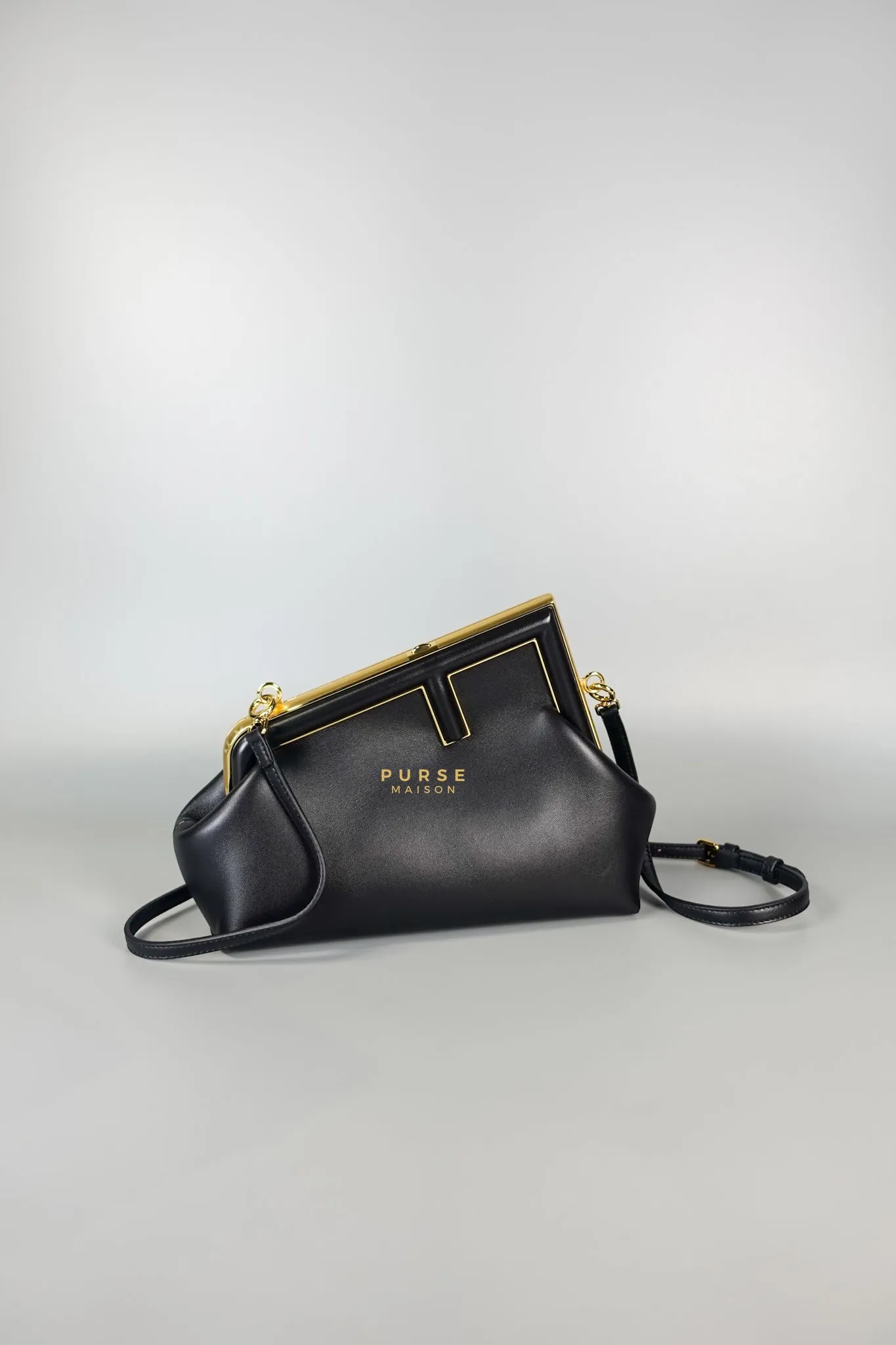 First Small in Noir Nappa Bag