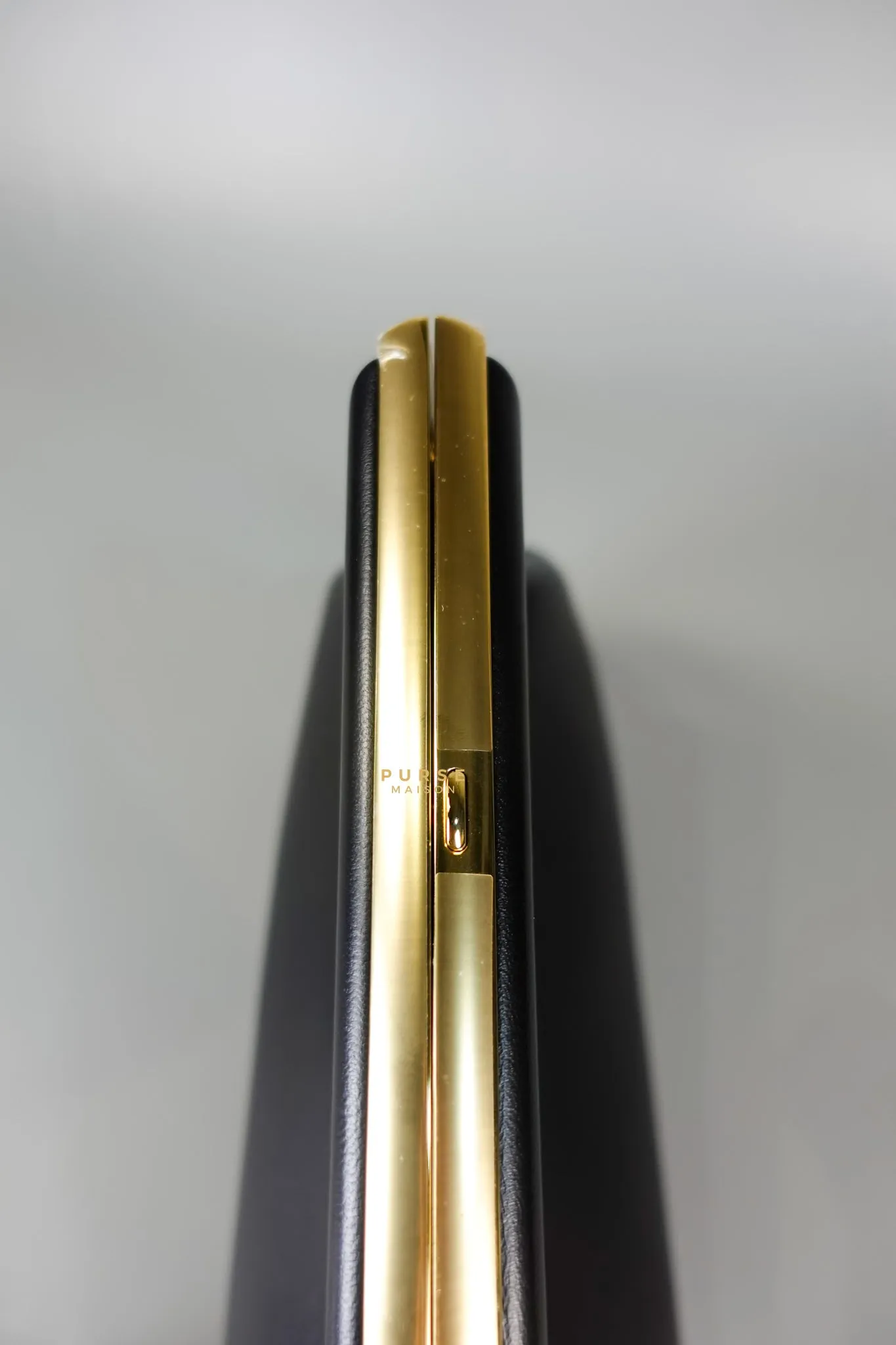 First Small in Noir Nappa Bag