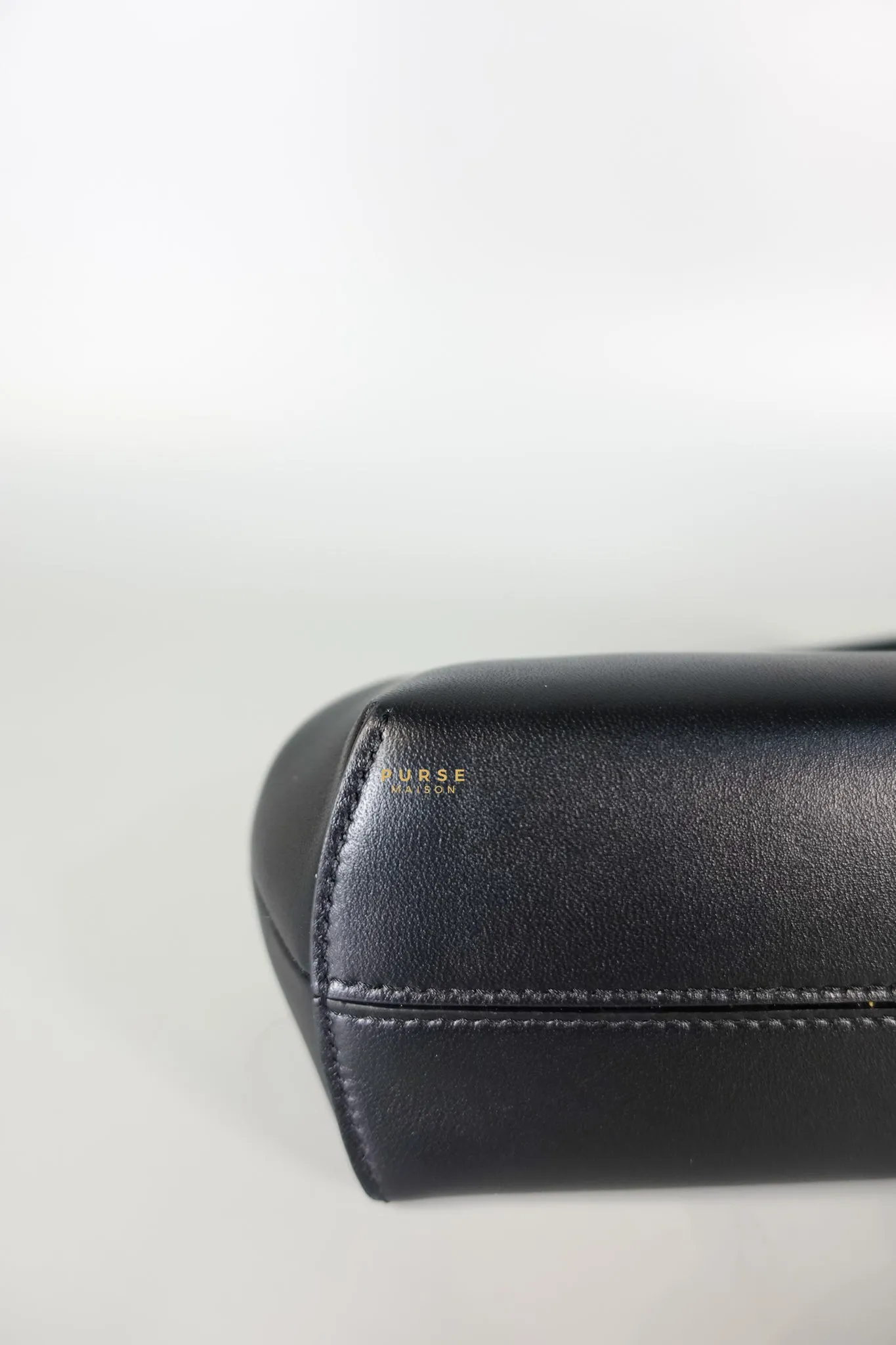 First Small in Noir Nappa Bag