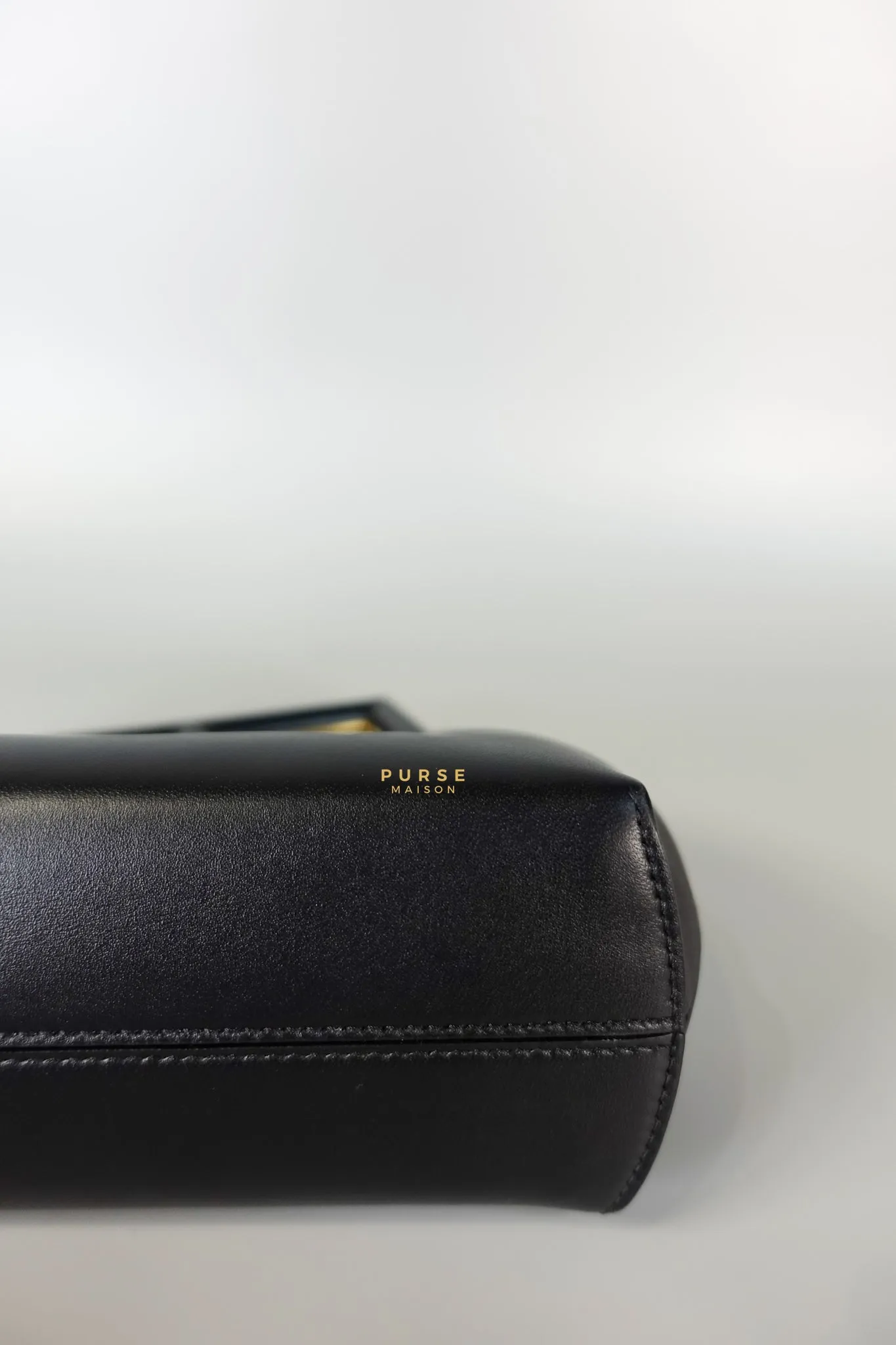 First Small in Noir Nappa Bag
