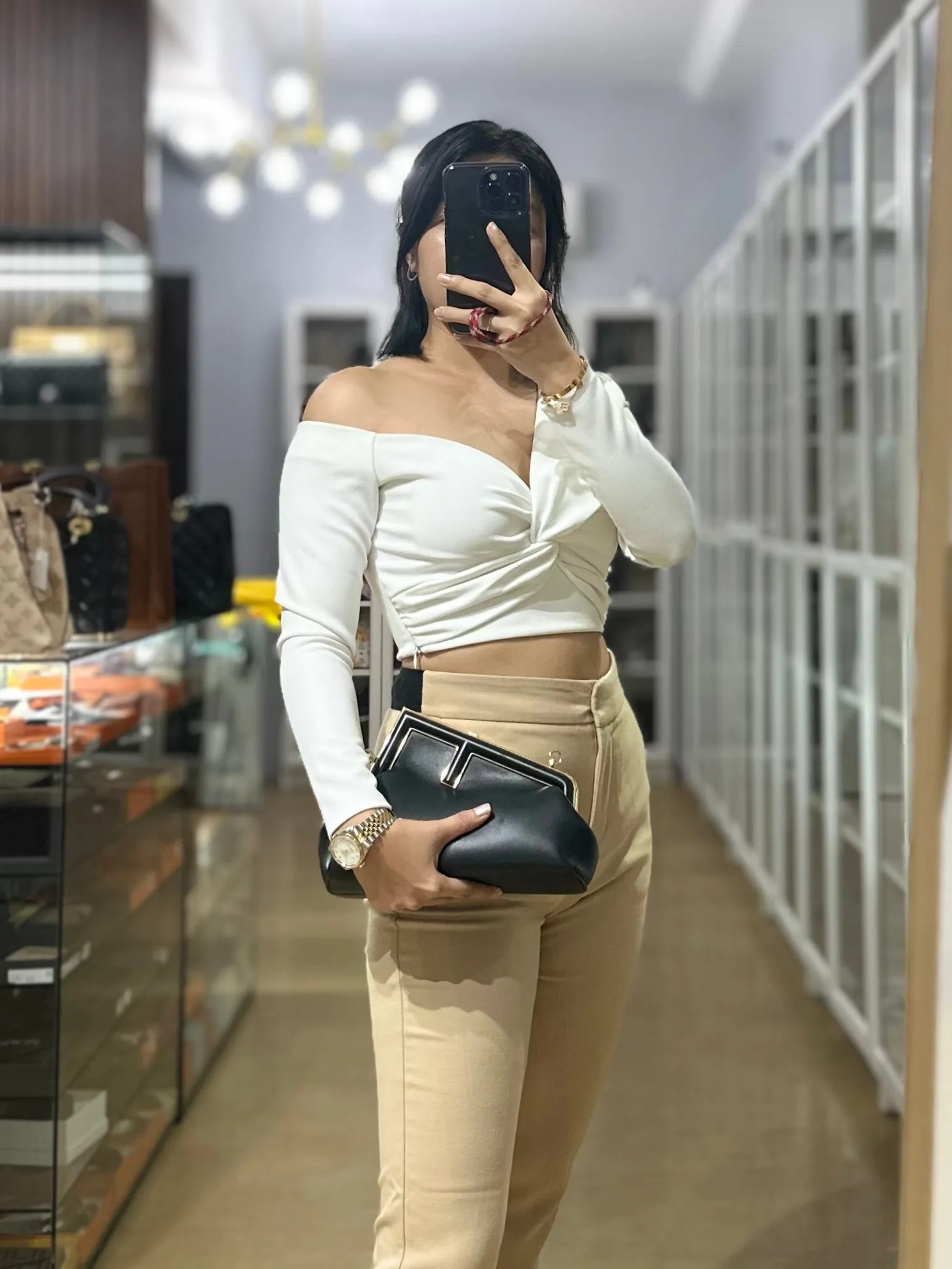 First Small in Noir Nappa Bag