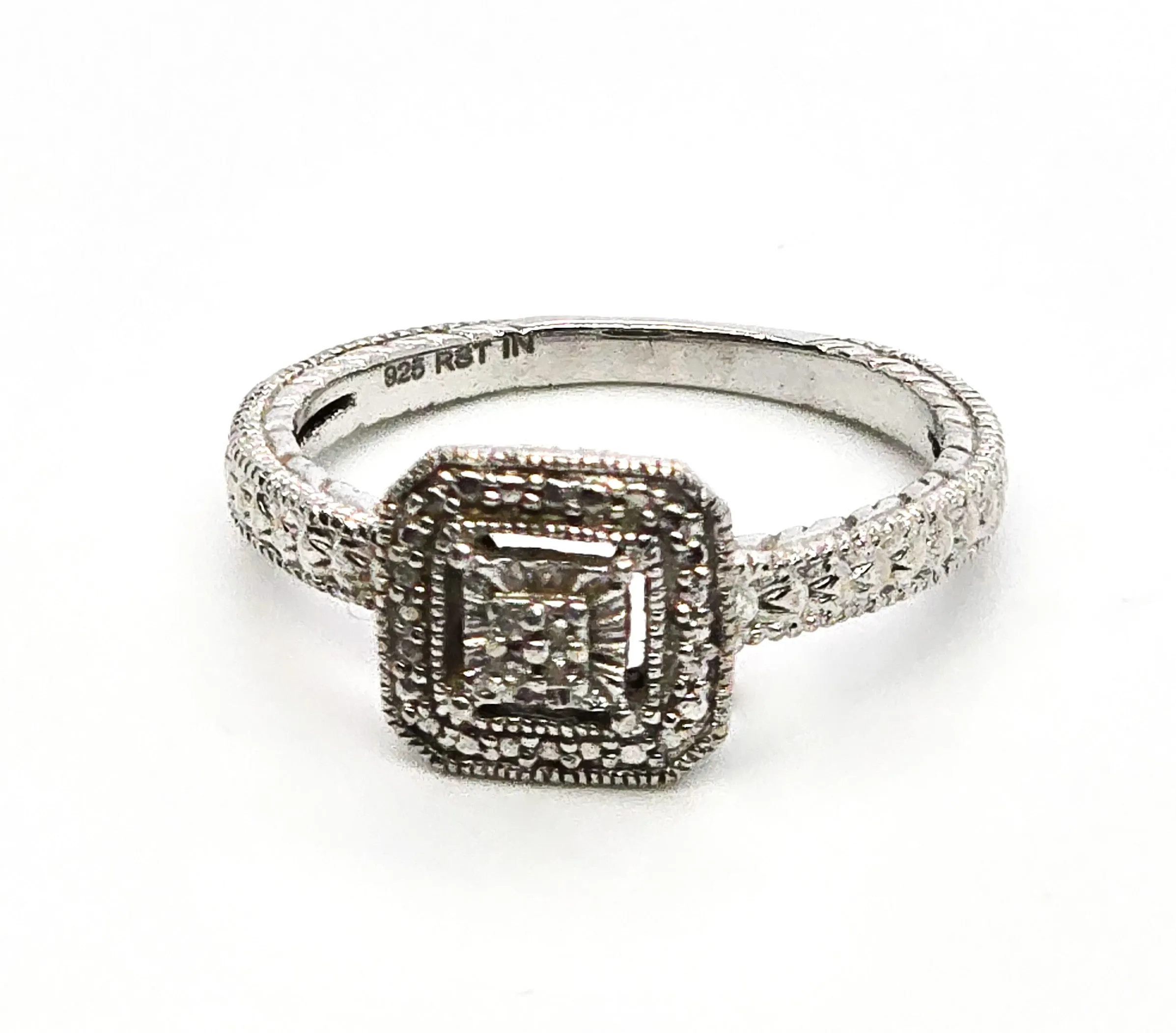 White sapphire embossed sterling silver halo ring size 6 RST IN